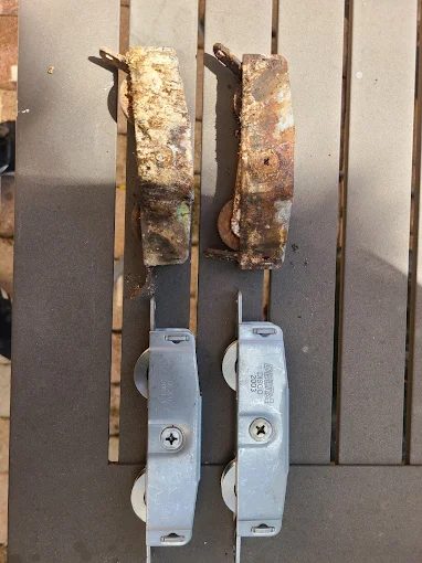 Old corroded rollers vs new replacement rollers side by side